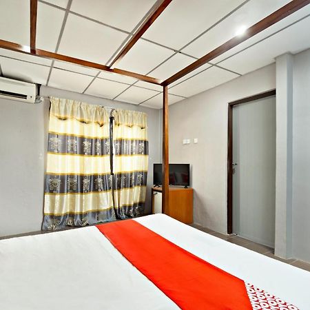 โอโย 44101 โฮเต็ล Dj พาเลซ Hotel ลุมุต ภายนอก รูปภาพ